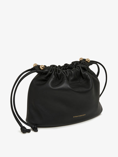 Strathberry Black Charlotte drawstring bag at Collagerie