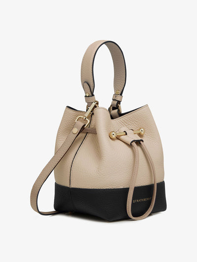 Strathberry Black, oat and mushroom Osette bucket bag at Collagerie