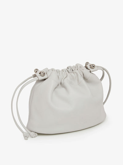 Strathberry Glacier grey Charlotte drawstring bag at Collagerie