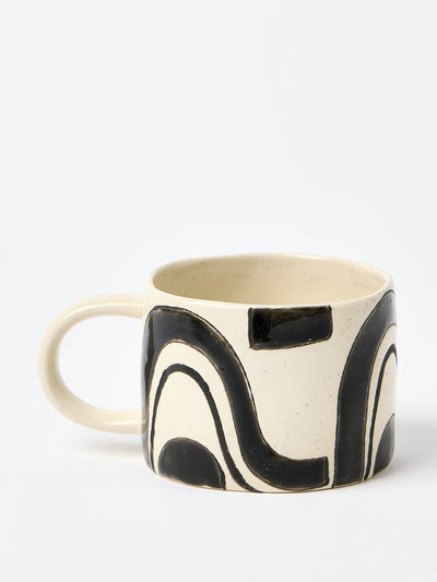 Oliver Bonas Monochrome swirl speckle ceramic mug at Collagerie