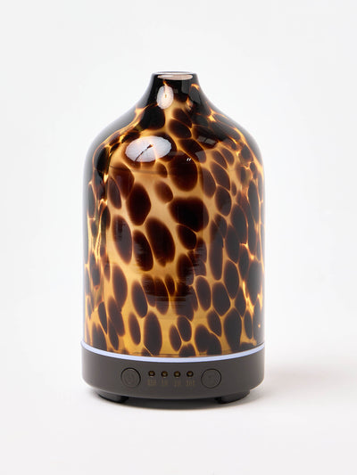 Oliver Bonas Tortoiseshell glass essential oil electric aroma diffuser at Collagerie