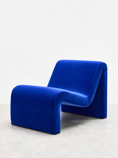 Oliver Bonas Pambo cobalt blue velvet lounge chair at Collagerie