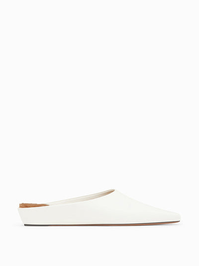 NEOUS Cream Alba shearling mules at Collagerie