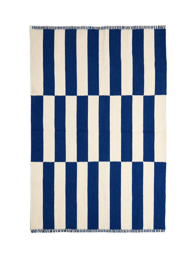 Oliver Bonas Simeon blue and white stripe wool rug at Collagerie