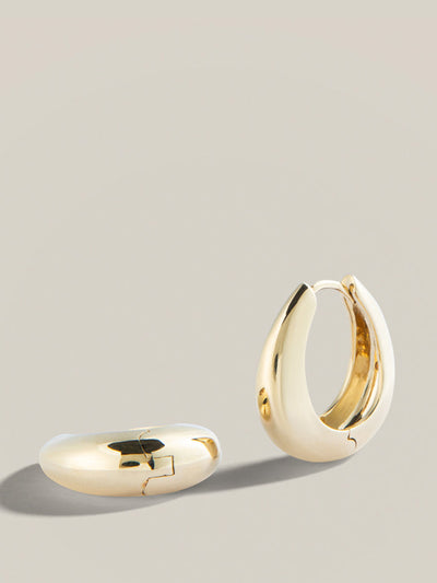 Lucy Delius Polished finish gold dust oval hoops at Collagerie