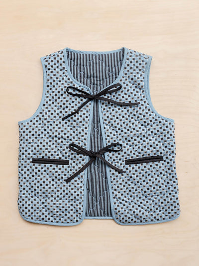 TBCo Quilted cotton vest in reversible blue celestial stripe at Collagerie