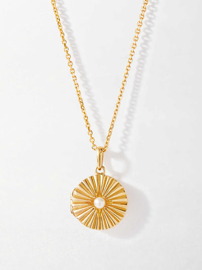 Edge of Ember Gold radiant pearl locket necklace at Collagerie