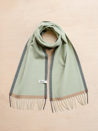 TBCo Cashmere and merino scarf in green contrast edge at Collagerie