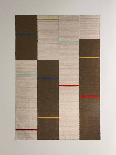 Zara Home x Collagerie Wool and cotton rug with stitching at Collagerie