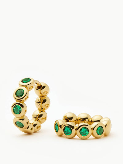 Missoma Tennis small hoop earrings in gold vermeil and emerald green nano crystal at Collagerie
