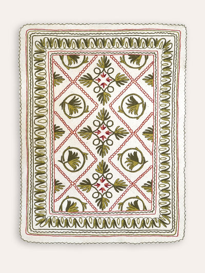 Birdie Fortescue Green and pink Namda felt embroidered rug at Collagerie