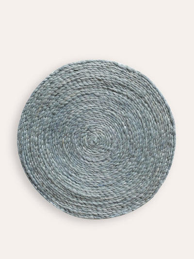 Birdie Fortescue Light blue round jute placemat at Collagerie