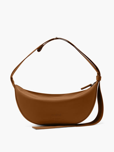 Been X Aligne Brown recycled-leather Wellesley sling bag at Collagerie