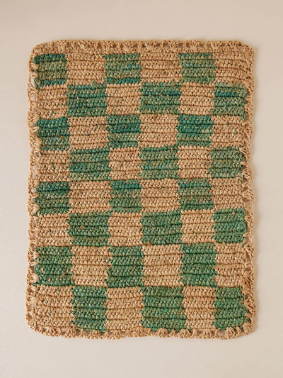 Payton James Green checkerboard raffia placemat at Collagerie