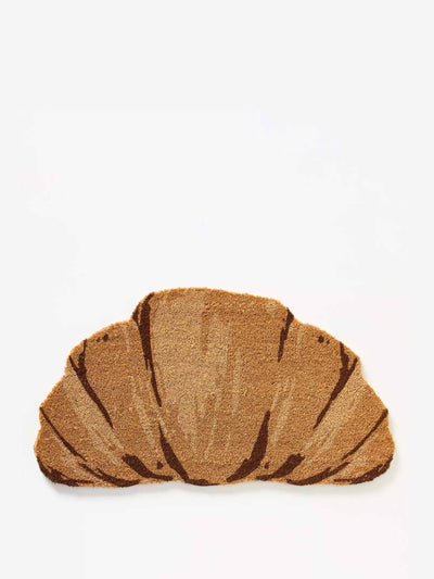 Anthropologie Croissant-shaped coir printed doormat at Collagerie