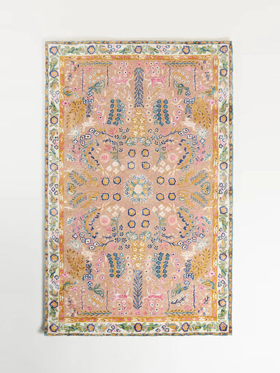 Anthropologie Hand-tufted pink rug at Collagerie