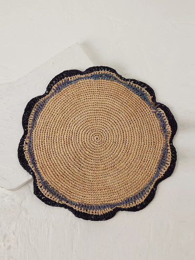 Payton James Woven raffia round placemat at Collagerie