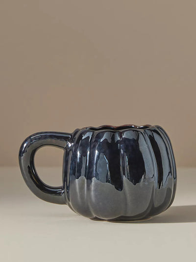 Anthropologie Black pumpkin-shaped mug at Collagerie