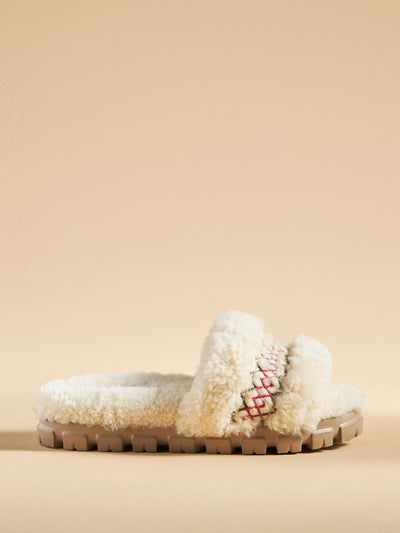 Ugg Braided sheepskin slippers at Collagerie