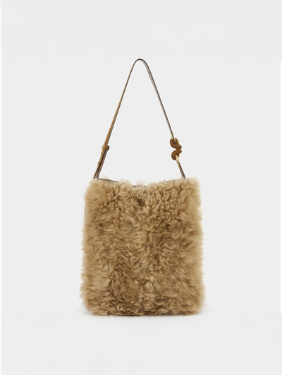 Anya Hindmarch Ringo shearling shoulder bag at Collagerie