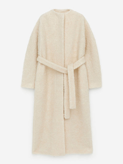 Arket Bouclé wool coat at Collagerie