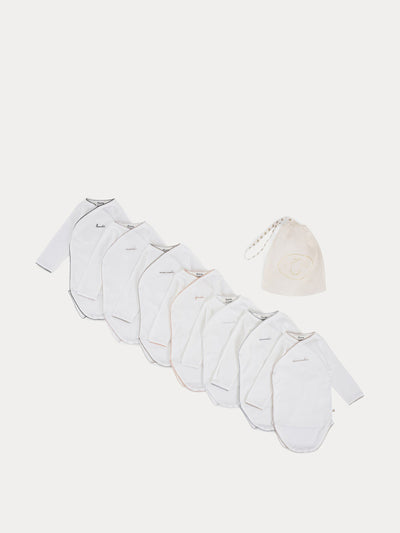 Bonpoint White crossover bodysuits (set of 7) at Collagerie