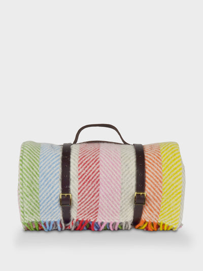 The British Blanket Co. Rainbow stripe blanket with leather straps at Collagerie