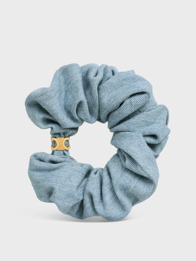 Celine Scrunchy denim in cotton and brass with gold finish at Collagerie