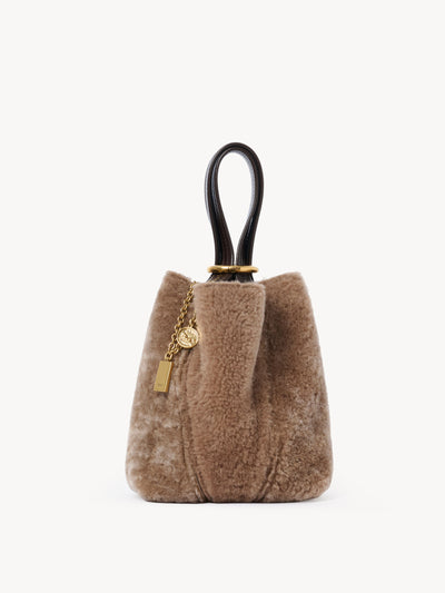 Chloé Small Chloé Spin tote bag in shearling at Collagerie