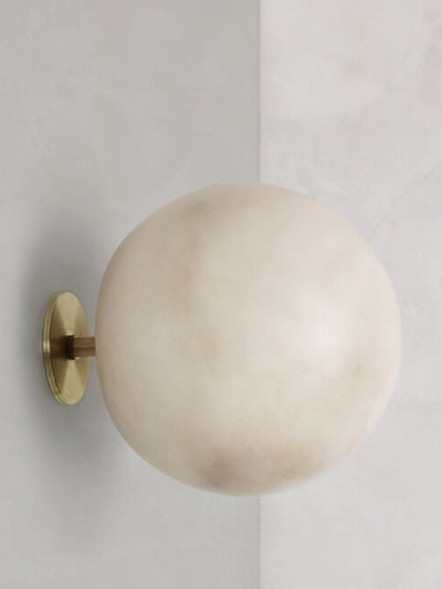 Contain Alabaster and brass wall light at Collagerie