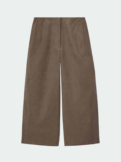 Cos Corduroy barrel-leg trousers at Collagerie