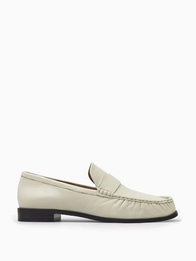 Cos Off-white leather loafers at Collagerie