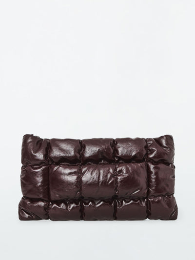 Cos Pillow quilted leather clutch at Collagerie