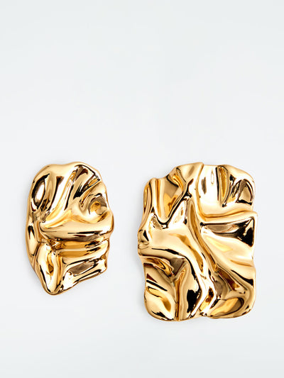 Cos Scrunched mismatched earrings at Collagerie