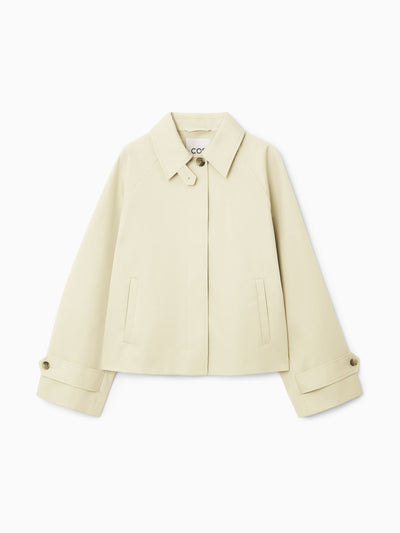 Cos Short twill trench coat at Collagerie