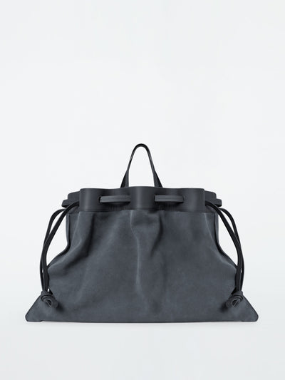 Cos Suede drawstring tote bag at Collagerie