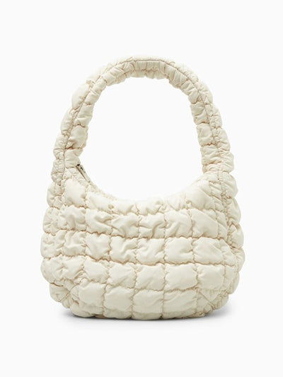 Cos Oversized quilted crossbody bag at Collagerie