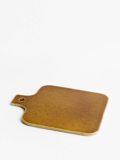 Pomax Spiro presentation plate in brown at Collagerie