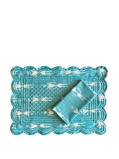 Cutter Brooks Scalloped quilted ikat placemat and napkin set at Collagerie