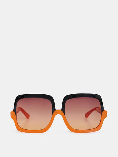 Essentiel Antwerp Orange and black oversized two-tone sunglasses at Collagerie