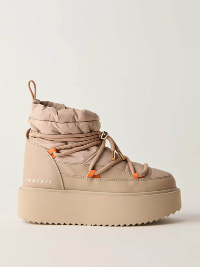 Inuikii Tech platform snow boots at Collagerie