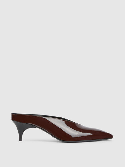 Gucci Women's Gucci 97 heeled mules at Collagerie