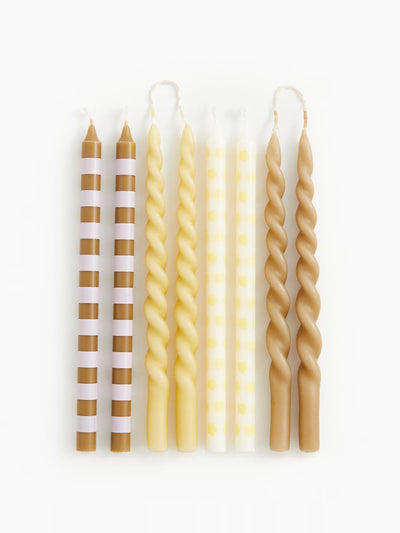 H&M Home 8-pack thin taper candles at Collagerie