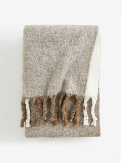 H&M Home Patterned wool-blend blanket at Collagerie