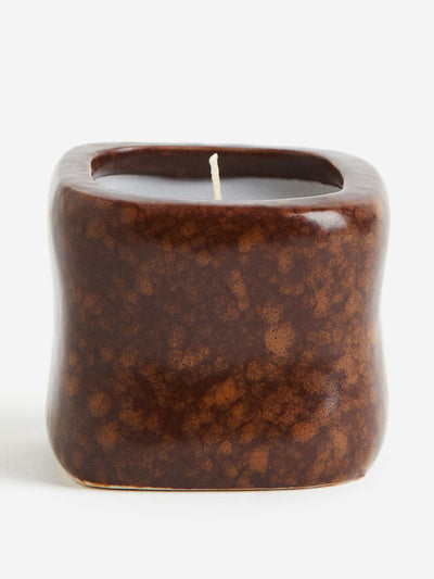 H&M Home Scented candle in a ceramic holder at Collagerie