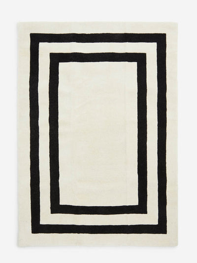 H&M Home White patterned wool rug at Collagerie