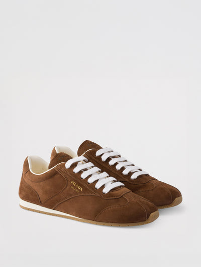 Prada Suede logo low-top sneakers at Collagerie