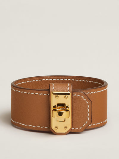 Hermès Brown leather twist bracelet at Collagerie