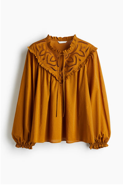 H&M Broderie anglaise-detail blouse at Collagerie