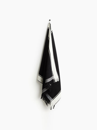 H&M Home Fringed beach towel at Collagerie